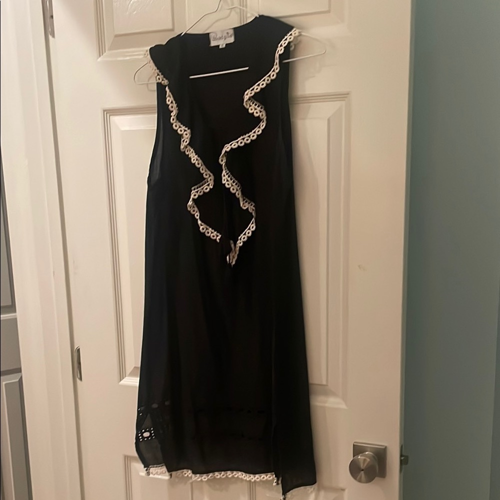 Black Sleeveless Dress with White Trim